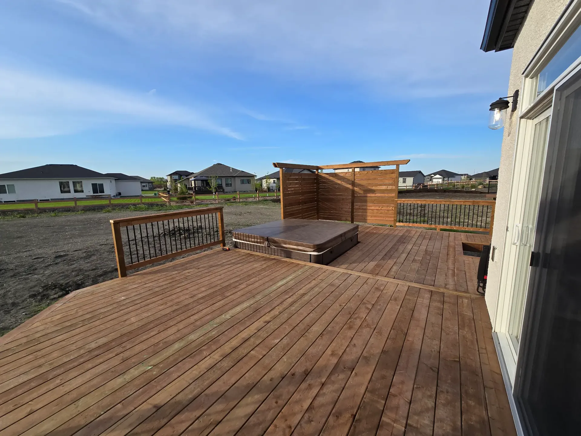 Cedar deck with pergola in Winnipeg