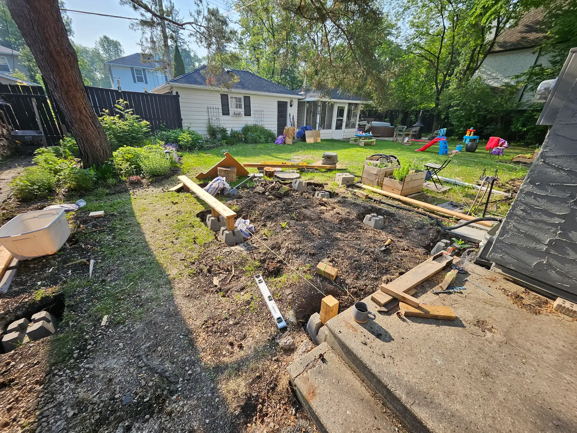 Deck site preparation before construction in River Heights, Winnipeg
